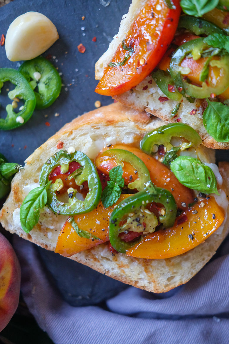 Goat Cheese Toast with Caramelized Peaches and Spicy Jalapenos